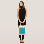 a blue background with a black and white cat on to tote bag<br><div class="desc">5 Unique Customisable All-Over-Print Totes. Discover versatile and stylish All-Over-Print Tote Bags. Eco-friendly, customisable, and perfect for any occasion. Make your next shopping trip fashionable! Stylish Functionality for Every Occasion : Elevate your everyday errands with our All-Over-Print Tote Bag. Measuring 16" in length and 16" in width, this medium-sized tote...</div>