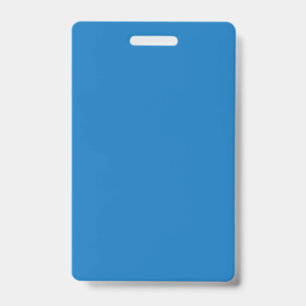a blue background with a black and white clock ID badge