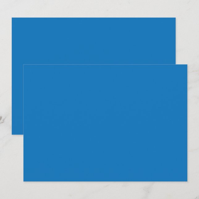 a blue background with a black and white clock invitation (Front/Back)
