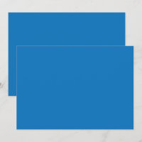 a blue background with a black and white clock