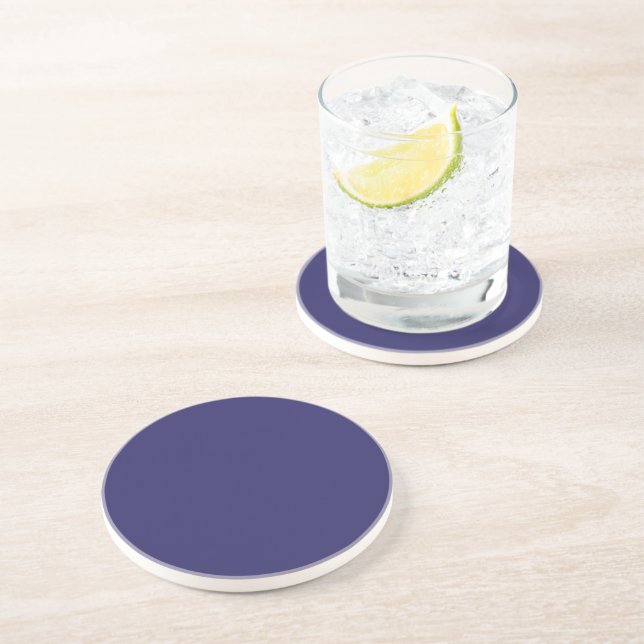 a blue background with a clock on it coaster (Side)