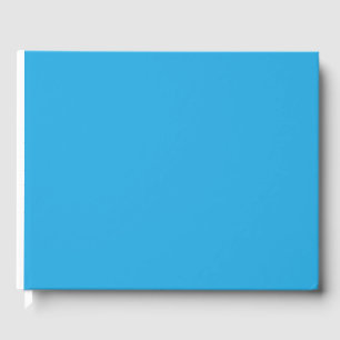 a blue background with a guest book