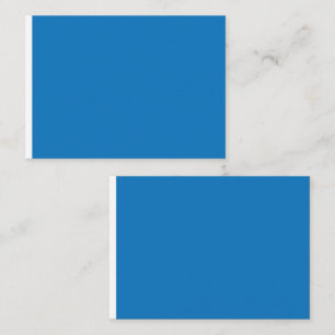 a blue background with a place card