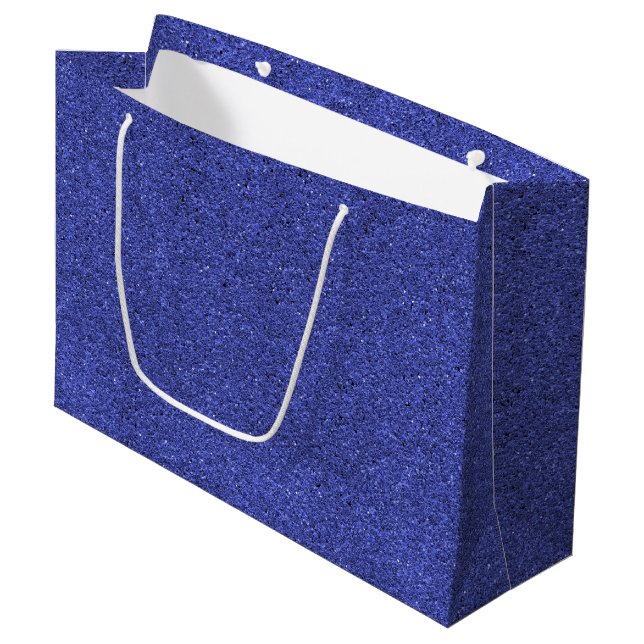 A blue glittery gift bag with white handles (Front Angled)