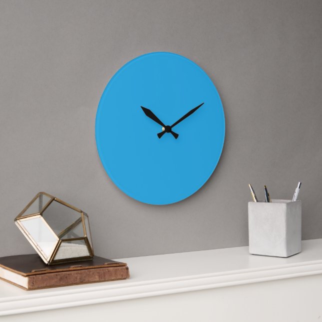 A blue square framed by a white border, presenting large clock (Office)
