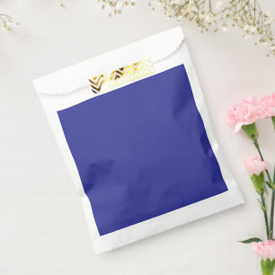 a blue wall with a clock  favour bags