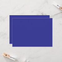 a blue wall with a clock