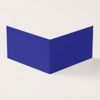 a blue wall with a clock on it