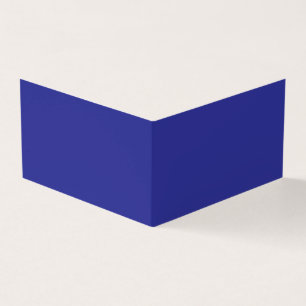 a blue wall with a clock on it