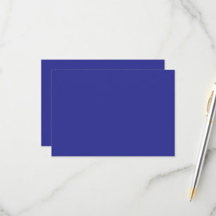 a blue wall with a clock RSVP card