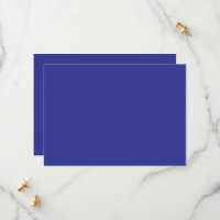a blue wall with a clock