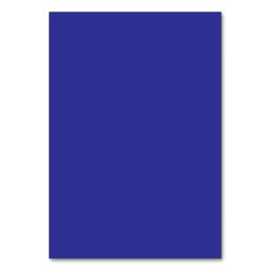 a blue wall with a clock  table number
