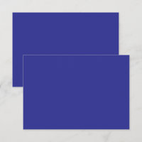 a blue wall with a clock