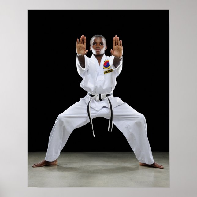 A Boy (15 Years Old) in a Karate Uniform with Poster (Front)
