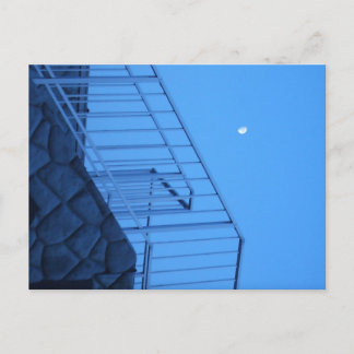 A breakwater by the sea and the moon postcard