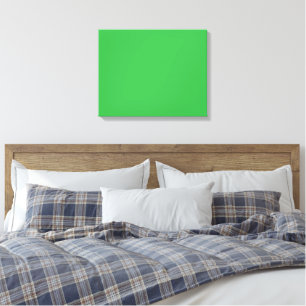 A bright green screen set against a clean white ba canvas print