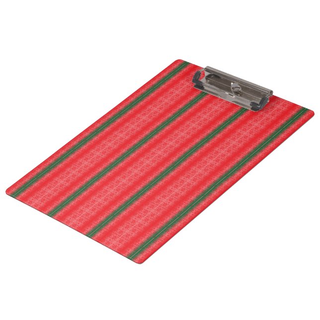 A bright red apple sits on a plain white surface. clipboard (Angled)