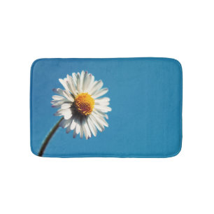 A Bright White Daisy under a Big Blue Sky Bath Mat