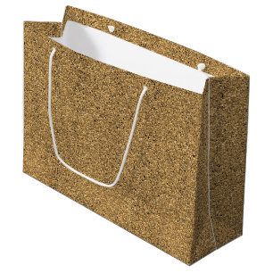 A brown paper bag with a white handle
