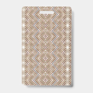 A brown rug displaying a symmetrical design featur ID badge
