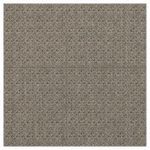 A brown rug with a geometric motif is partially co fabric