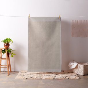 A brown rug with an intricate motif lies on the fl fabric