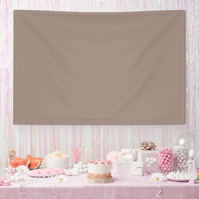 a brown wall with a banner (Party)