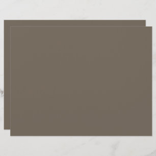 a brown wall with a black and white clock on it custom letterhead