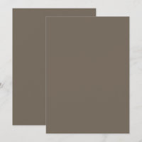 a brown wall with a black and white clock on it