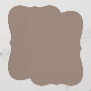 a brown wall with a clock on it