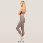 a brown wall with a clock on it capri leggings<br><div class="desc">The image is a close-up of a beige wall,  which appears to be a part of a building. The wall is smooth and has a uniform texture,  giving it a plain and simple appearance.</div>