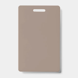 a brown wall with a clock on it ID badge