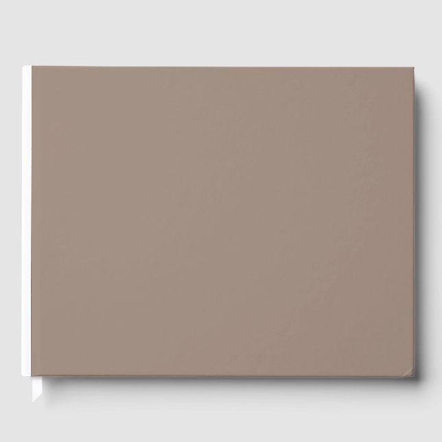 a brown wall with a guest book (Front)
