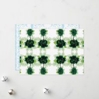 a bunch of green flowers on a white background