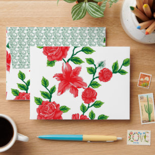 a bunch of red flowers on a white background envelope