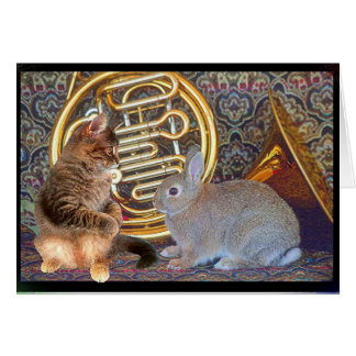 A bunny, a kitten and a French horn
