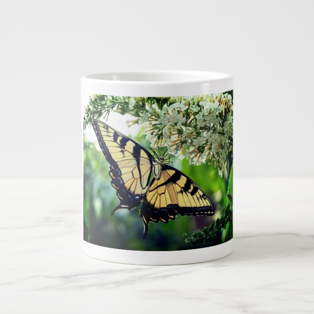A butterfly with yellow and black wings  large coffee mug (Front)