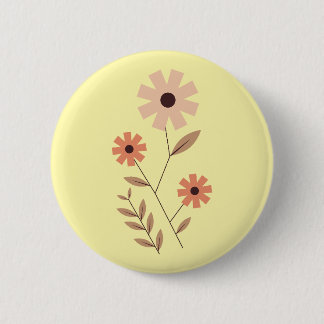 a button with a painting in the shape of a cosmos