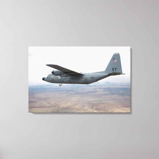 A C-130 Hercules soars through the sky Canvas Print (Front)