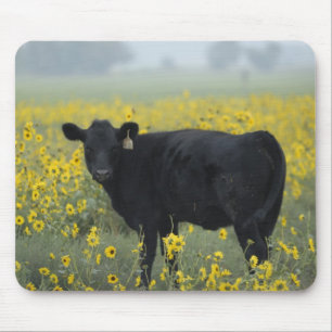 A calf amid the sunflowers of the Nebraska Mouse Pad