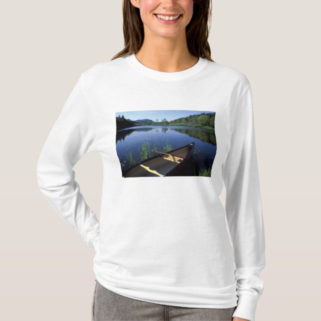 A canoe rests on the shore of Little Long Pond T-Shirt (Front)