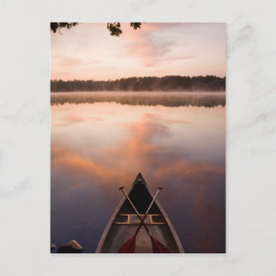 A canoe rests on the shore of Pawtuckaway Lake Postcard