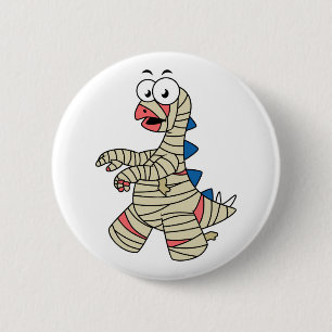 A Cartoon Stegosaurus Dressed Up As A Mummy. 6 Cm Round Badge