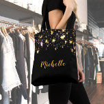 A cascade of golden stars on black add name tote bag<br><div class="desc">A black background with a cascade of golden shining stars,  a bit of bling and luxury.  Golden letters and template for Your name.</div>