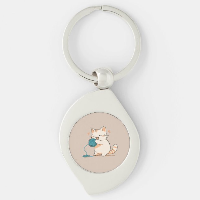 A cat spinning yarn is so cute key ring (Front)