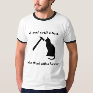 A cat will blink when struck with a hammer T-Shirt