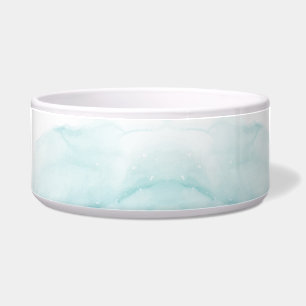 A ceramic bowl with a soft, pastel aqua watercolor