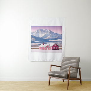 A charming pink cottage, surrounded by a wide open tapestry