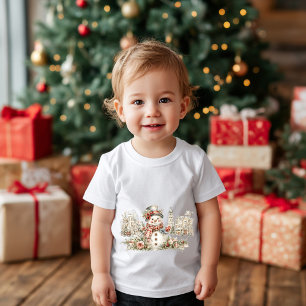 a cheerful Christmas snowman on the street Baby T-Shirt