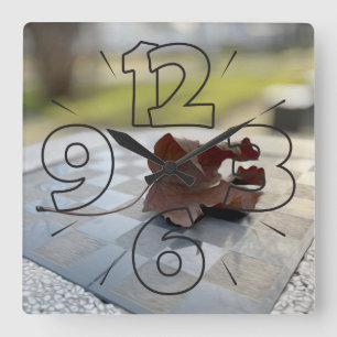 A chess lesson square wall clock